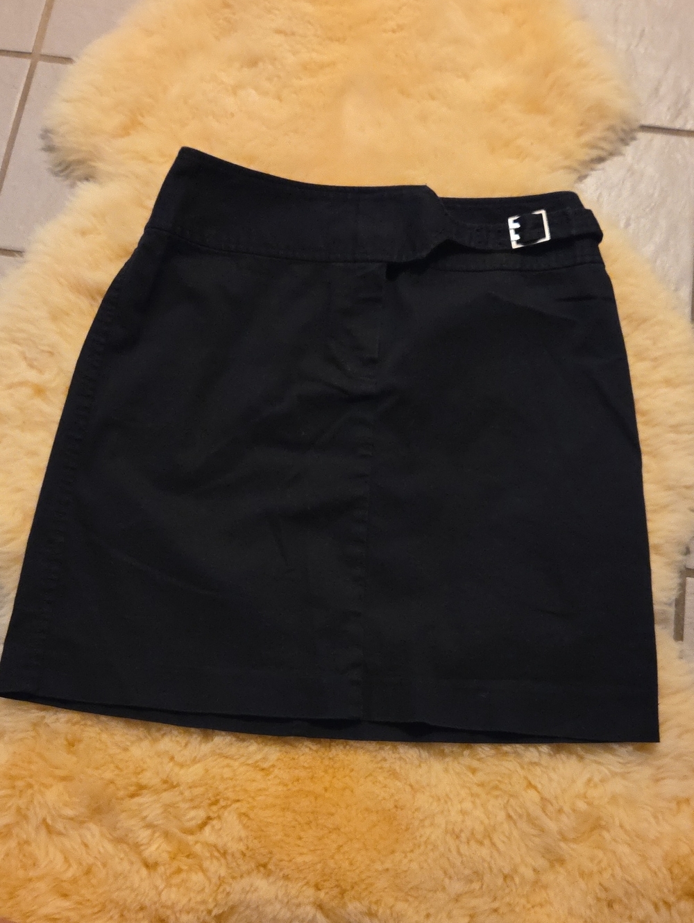 The Limited Black Mini Skirt with Buckle Detail